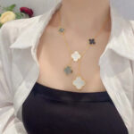 CLOVER 6 MOTIF MOP ONYX GOLD NECKLACE