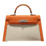 Her.mès Bag | Kelly Bag In Orange Leather And A Neutral Canvas Material - Image 2