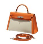 Her.mès Bag | Kelly Bag In Orange Leather And A Neutral Canvas Material