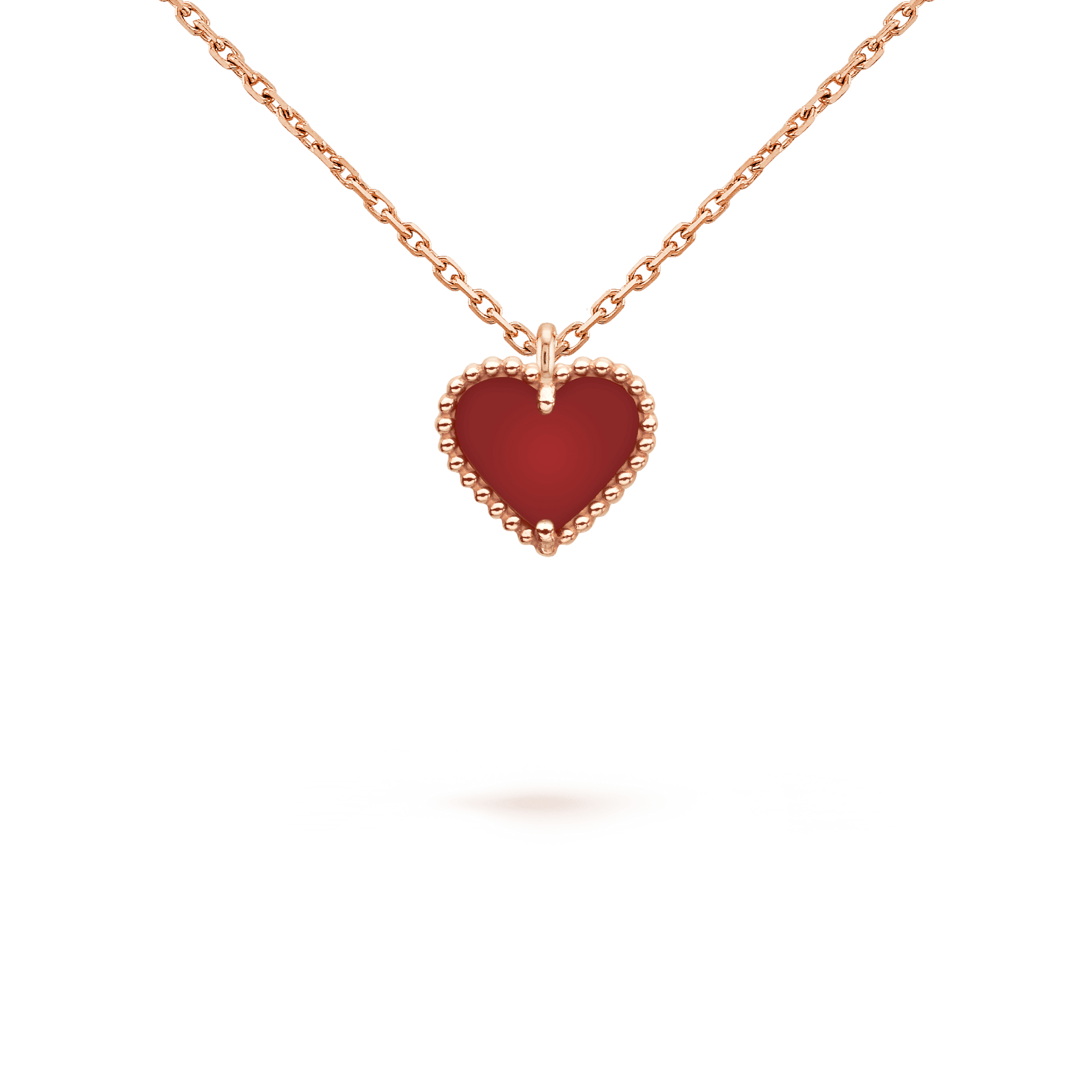 van-cleef-arpels-sweet-alhambra-heart-pendant-rose-gold-carnelian-vcarn59n00-coral-2_9578a393-65ad-43f9-88a1-e4978e5e3adb SWEET CLOVER CARNELIAN HEART NECKLACE - Image 1
