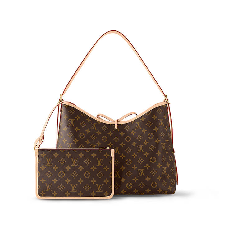 fb963426fa142cf70600718615f75337 LV CarryAll MM - Image 1