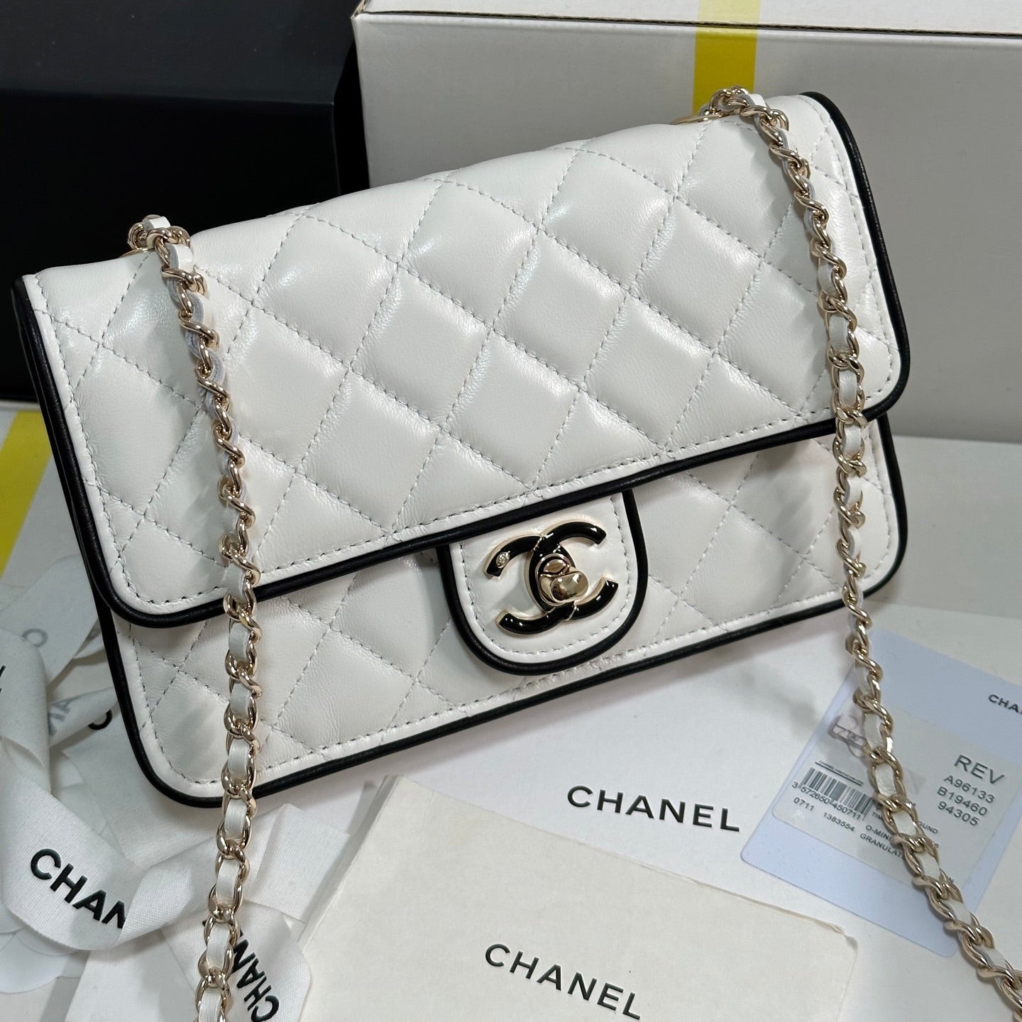 img_b885826e_20250327_i1743088547064_5469_0_1_jpg QUILTED FLAP BAG WITH BLACK TRIM 19 IN WHITE LAMBSKIN - Image 1