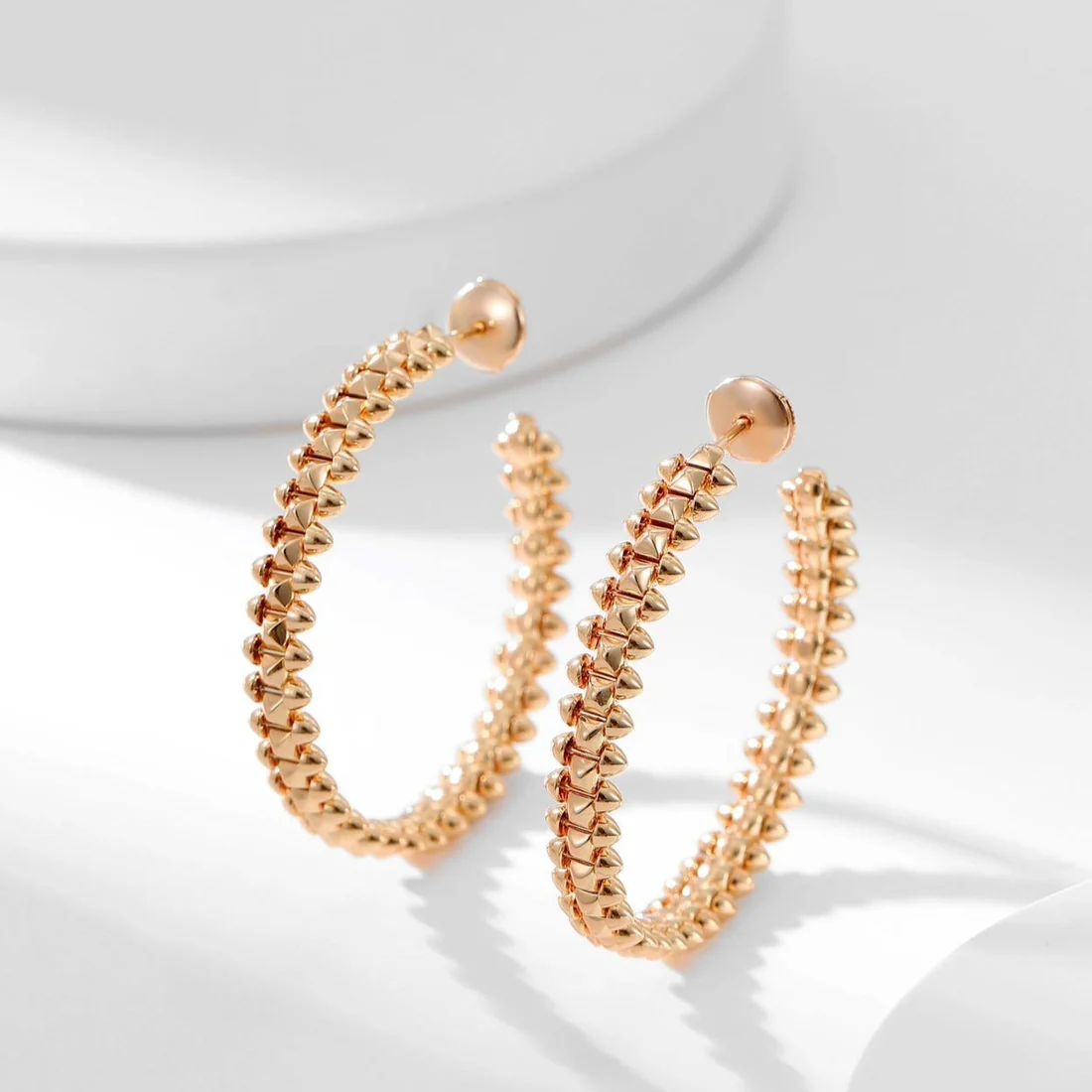 13335782726592432_eab216f6-c575-43ef-b1fb-306390769b11.webp CLASH HOOP EARRINGS - Image 1