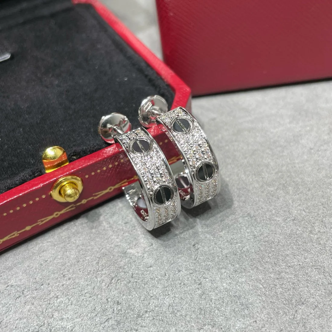 13339152830437295_9afa058a-b5cc-4cc1-a41a-3508a8b531f0.webp LOVE CERAMIC DIAMOND PAVED SILVER EARRINGS - Image 1