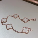 CLOVER 5 MOTIF ROCK CRYSTAL BRACELET