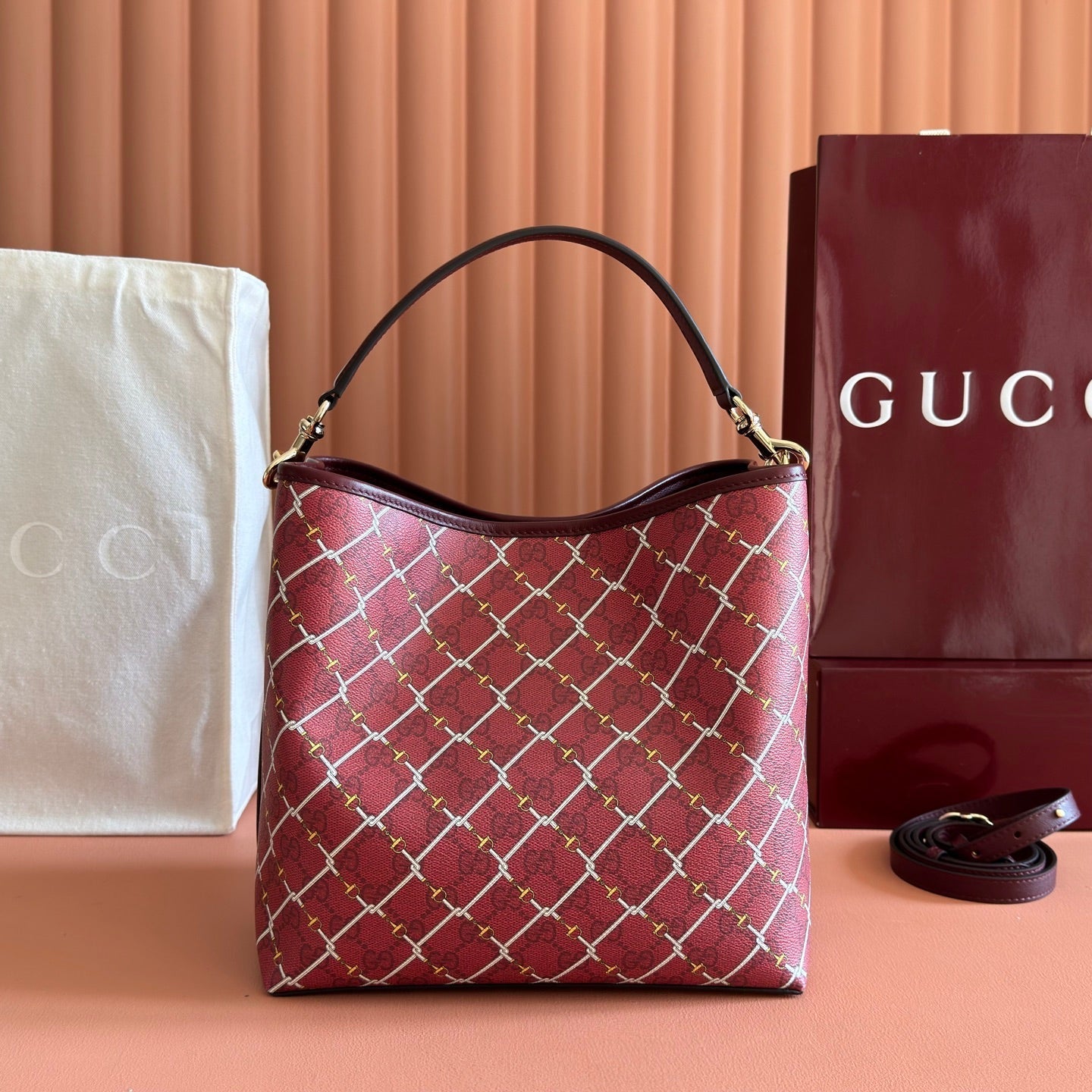 img_89648692_20251230_i1767090087159_8990_0_1_jpg GUCCI 26S GG EMBLEM BUCKET BAG 25 IN DARK RED COATED FABRIC - Image 1