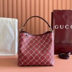 GUCCI 26S GG EMBLEM BUCKET BAG 25 IN DARK RED COATED FABRIC - Image 2
