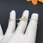 FRIVOLE GOLD 5 FLOWERS BRACELET - Image 3